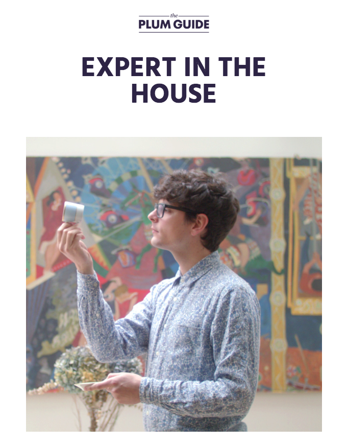 A house interior expert who examines a piece of furniture