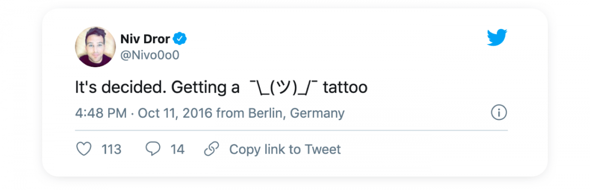Niv Dror's tweet about getting a shrug emoji tattoo